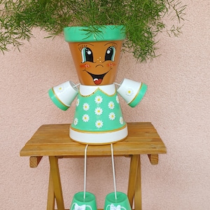 Lerkrukafigur, terrakotta, docka, blomkruka