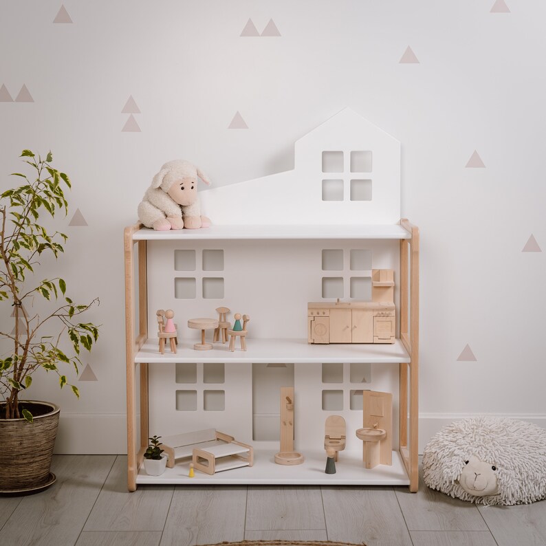 On the picture is our NOBI dollhouse, with a unique design, which let's children to play with dolls. After your child is a toddler the dollhouse can be used as a shelf for books, photos or other items.