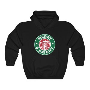May include: Black hooded sweatshirt with a green and white logo that says "Merry & Bright" with a stylized image of a woman wearing a Santa hat.