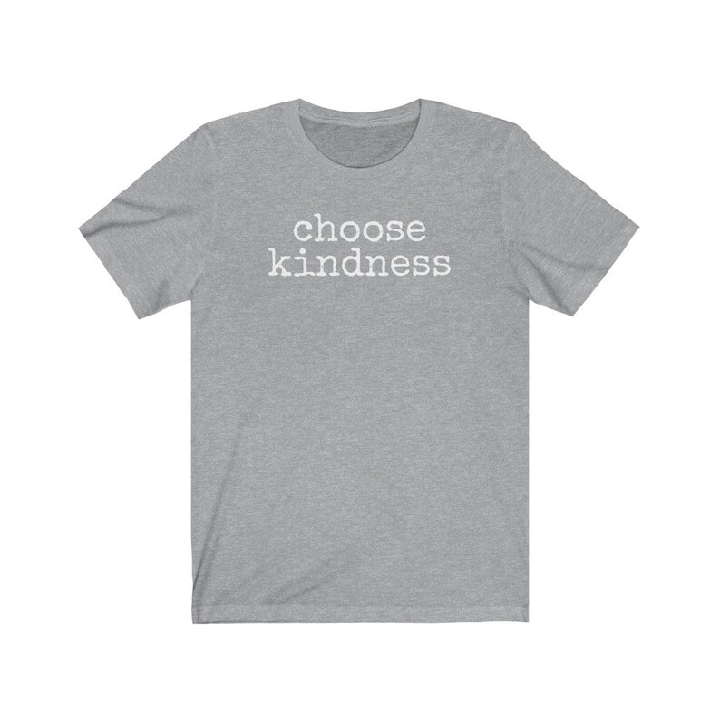 May include: A heather gray t-shirt with the words "choose kindness" printed in white across the chest. The shirt has short sleeves and a crew neck.