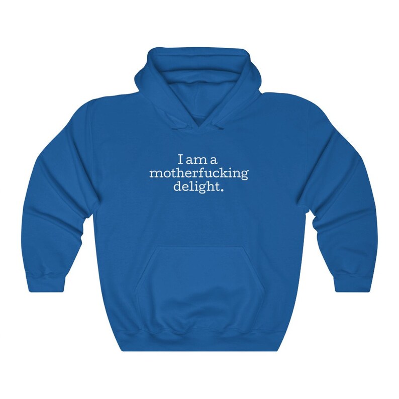 May include: A royal blue hooded sweatshirt with the text "I am a motherfucking delight." printed in white on the front.