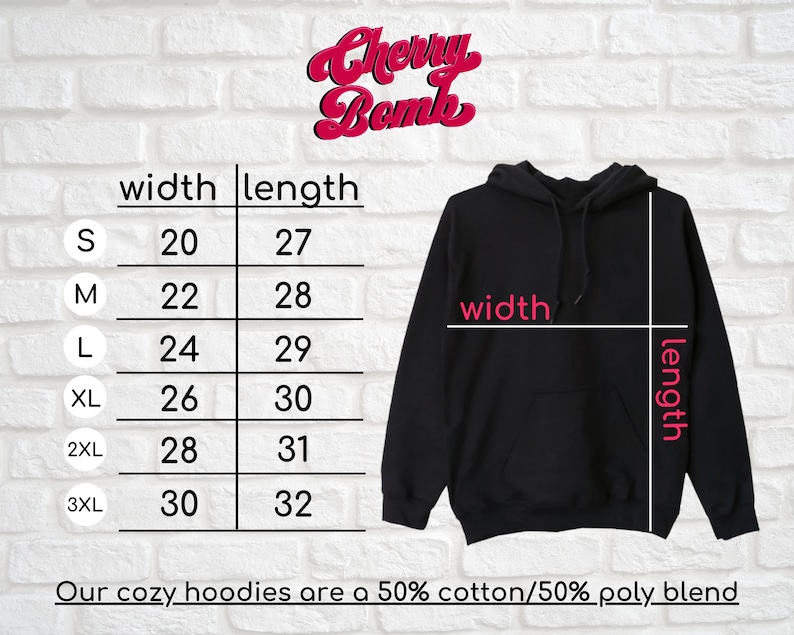 May include: Size chart for a black hooded sweatshirt with measurements in inches for width and length. The chart shows sizes S through 3XL. The text "Our cozy hoodies are a 50% cotton/50% poly blend" is at the bottom of the chart.