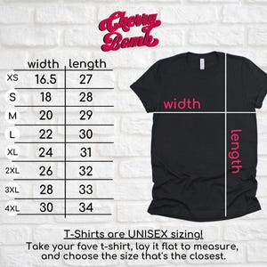 May include: Black t-shirt with a size chart and the text "Cherry Bomb". The chart shows width and length measurements in inches for sizes XS to 4XL. The text below the chart reads "T-Shirts are UNISEX sizing!"