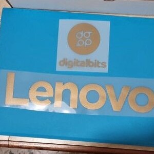 May include: A gold Lenovo logo on a blue background. The logo is a stylized wordmark with the letters "Lenovo" in a bold, sans-serif font.