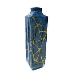 Kintsugi ,Kintsugi gifts, kintsugi Vase, Japanese art in repairing with gold a broken pottery, kintsukuroi bowl, kintsugi pottery