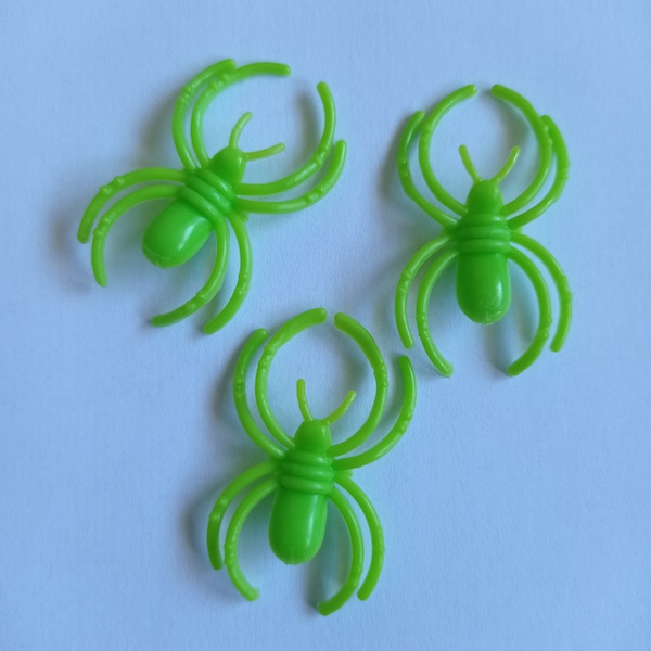 Araignées en plastique couleur verte Halloween