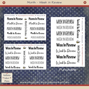 May include: A set of printable planner stickers with the text "Month in Review" and "Week in Review" in black and white text. The stickers are designed to be punched out and used in a planner.