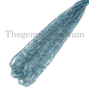 May include: A strand of light blue aquamarine beads. The beads are faceted and have a slightly irregular shape. The strand is approximately 16 inches long.
