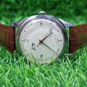 Vintage Collectible Original HMT JANATA Para Shock 17 Jewels Manual Winding Mechanical Antique Pre Owned Wrist Watch in Working Order.