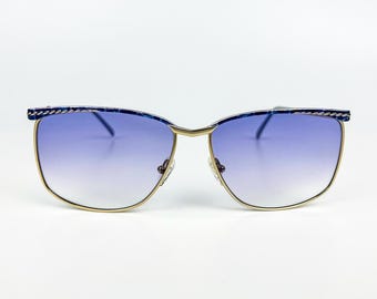 Occhiali da sole vintage Laura Biagiotti: montatura dorata anni '80 e lenti sfumate viola
