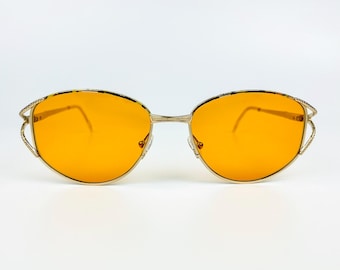 Vintage zonnebril – NOS retro gouden montuur uit de jaren 80 en oranje lenzen – Made in Italy