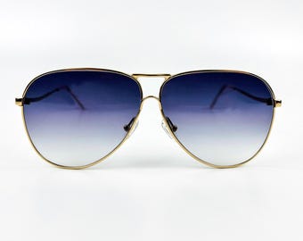Carrera Vintage-zonnebril: jaren 90 goudkleurig metalen frame, glazen met rookgradiënt - Made in Italy