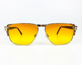 Occhiali da sole vintage Laura Biagiotti anni '80 - Montatura in metallo dorato, lenti arancioni - Made in Italy - NOS