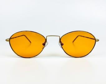 Vintage zonnebril Vogue – jaren 90 NOS retro goudkleurig frame met textuur en oranje lenzen – Made in Italy