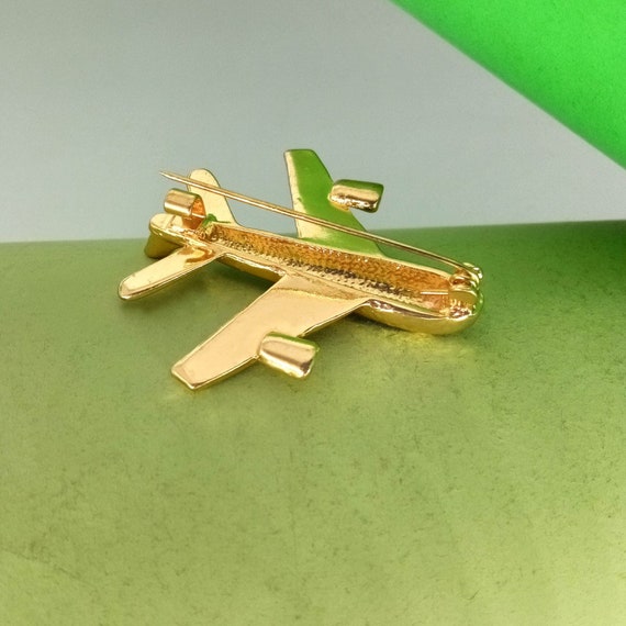 Plane brooch deals