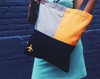 Shopper met vliegtuig, boodschappentas, schoudertas, cadeau voor haar, geel, groen, rood, bordo, tas met vliegtuig, luchtvaart, vliegtuig, ecotas, cadeau voor haar