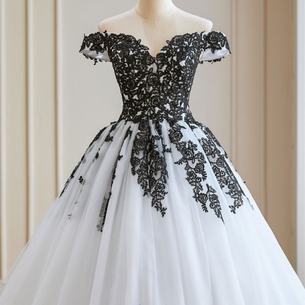 Beautiful White & Black Ballgown Wedding Dress with Off Shoulder Sleeves and Corset Back.