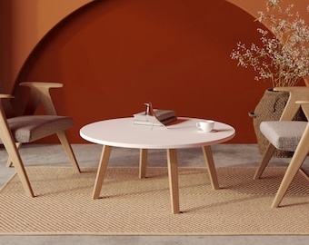 Round white coffee table made of wood, minimalist and Scandinavian style