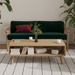 Wooden coffee table with solid oak rounded sides. Mid century modern design. Natural Oak wood coffee table with storage.