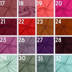 Pode incluir: Cart&atilde;o de amostra com 12 amostras de tecido em v&aacute;rias cores, incluindo vermelho, roxo, marrom, verde e rosa. As amostras s&atilde;o numeradas de 17 a 32.