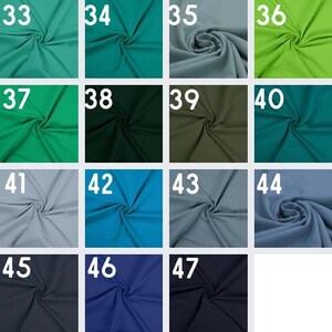 Pode incluir: Cart&atilde;o de amostra com 15 amostras de tecido em v&aacute;rias cores, incluindo turquesa, verde, azul e cinza. As amostras s&atilde;o numeradas de 33 a 47.