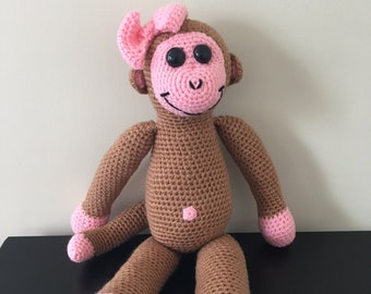 Crochet monkey with pink bow stuffed animal