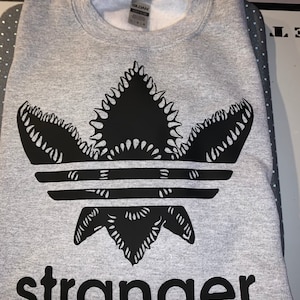 Stranger things***SWEATSHIRT*** with demogorgon design can be made any color hoodie and/or any color design.