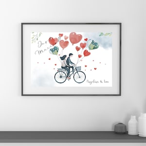 May include: A watercolor illustration of a couple riding a bicycle with red heart-shaped balloons. The balloons are filled with money bills. The text "Just Married" is written in cursive above the couple. The text "Angelina & Tim" is written below the couple.