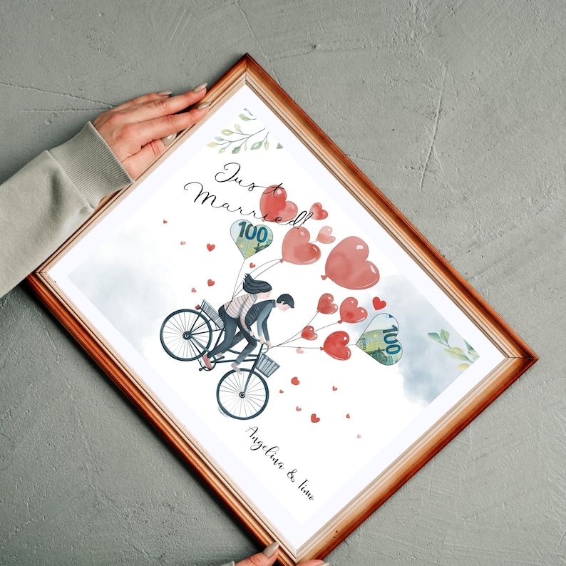 May include: A watercolor illustration of a couple riding a bicycle with red heart balloons. The balloons are filled with money, and the text "Just Married" is written above the couple. The couple's names, "Angelina & Jim", are written below the bicycle.