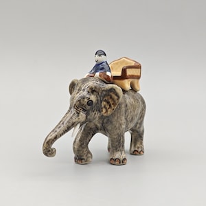 Ceramic elephant figurine: Home decor or gift