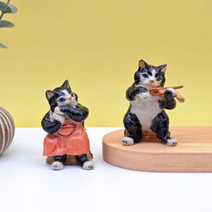 Salero y pimentero de cerámica con forma de gato, hechos a mano: decoración de cocina original y divertida.