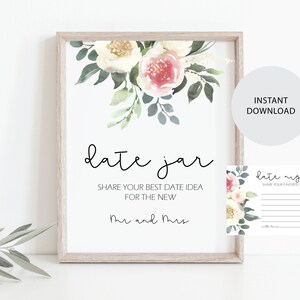 Pode incluir: Impressão emoldurada com detalhes florais e a frase "date jar". O texto diz: "Compartilhe sua melhor ideia de encontro para os recém-casados". Um cartão menor com "date night" também está incluído.