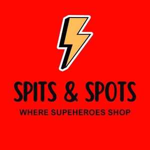 May include: A red background featuring a yellow lightning bolt with a black and white outline. Black script reads "SPITS & SPOTS" with "WHERE SUPERHEROES SHOP" underneath, promoting superhero merchandise.
