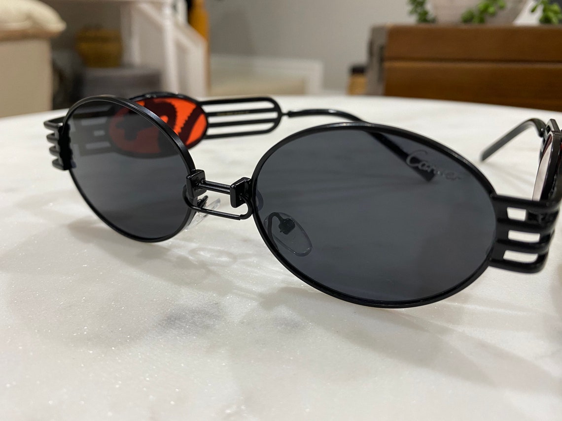 red lens cartier glasses