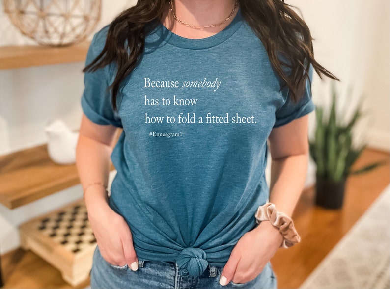 Enneagram Type 1 T-Shirt. Because Somebody Has To Know How To Fold A Fitted Sheet T-shirt. Funny Enneagram T-shirts. Enneagram Gift. image 1