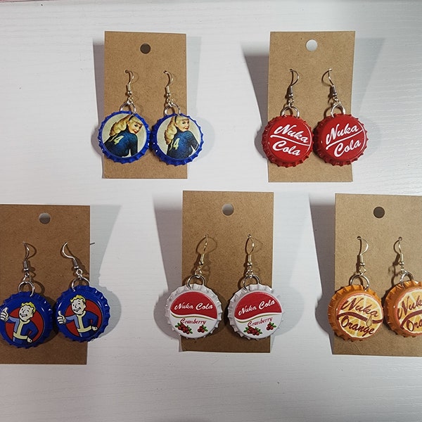 Unofficial Fallout Bottle Cap Earrings Nuka Cola, Vault Boy, Atom Bomb Baby, Quantum Theme 17 options available.