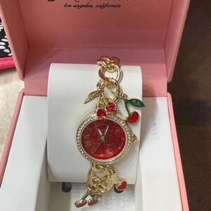 Juicy Couture Gold-Tone Charm Bracelet Watch With Red Charms Juicy Couture Gold Charm Watch | eBay main image 3