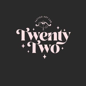 May include: Pink logo design with the text "Twenty Two" and a small circle logo above with the text "Tattoo Art Lab".