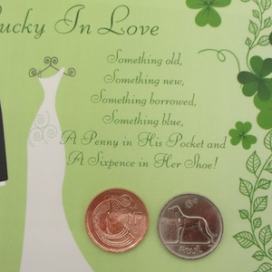 May include: A light green wedding-themed card with the text "Lucky In Love". It features a tuxedo, a wedding dress, and a poem about wedding traditions. Two coins are displayed at the bottom, one copper and one silver.