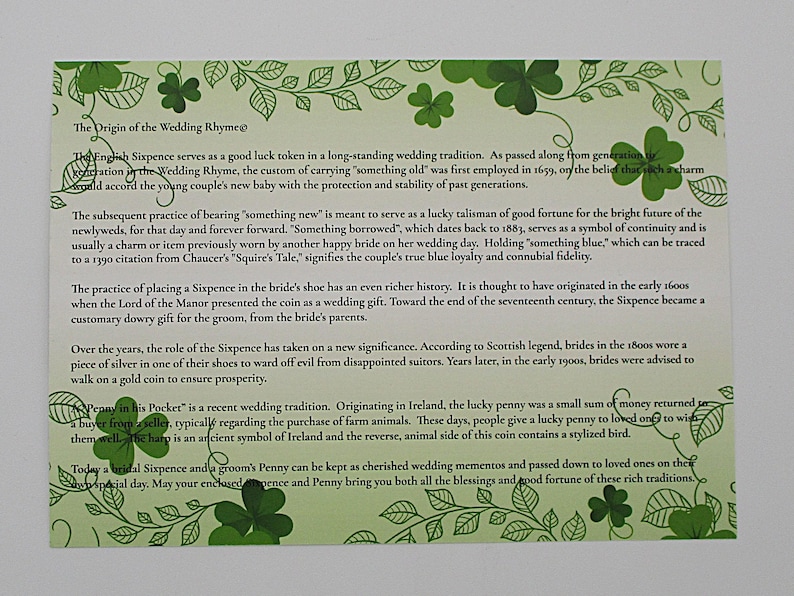 May include: A light green card with text about wedding traditions, including the English Sixpence and a lucky penny. The card has a border of green shamrocks and leaves.