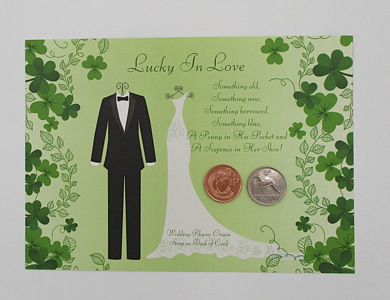 May include: A light green wedding card with the text "Lucky In Love" and a poem. The card features illustrations of a tuxedo, a wedding dress, and two coins. Green shamrocks decorate the borders.
