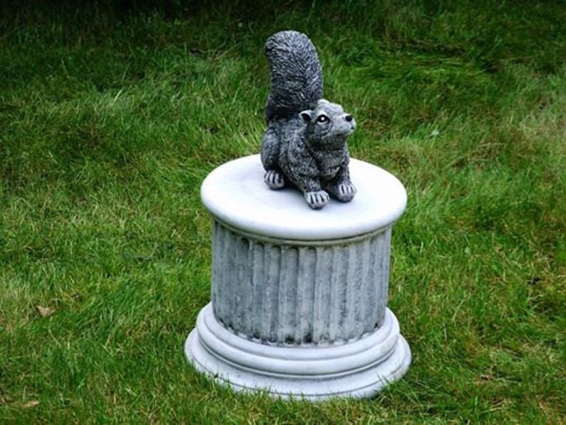 cement squirrel statue