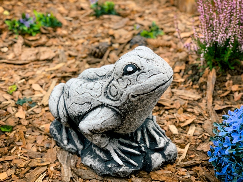 concrete frog statue
