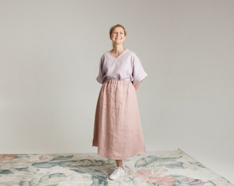 Midi linen skirt with side slit and pockets