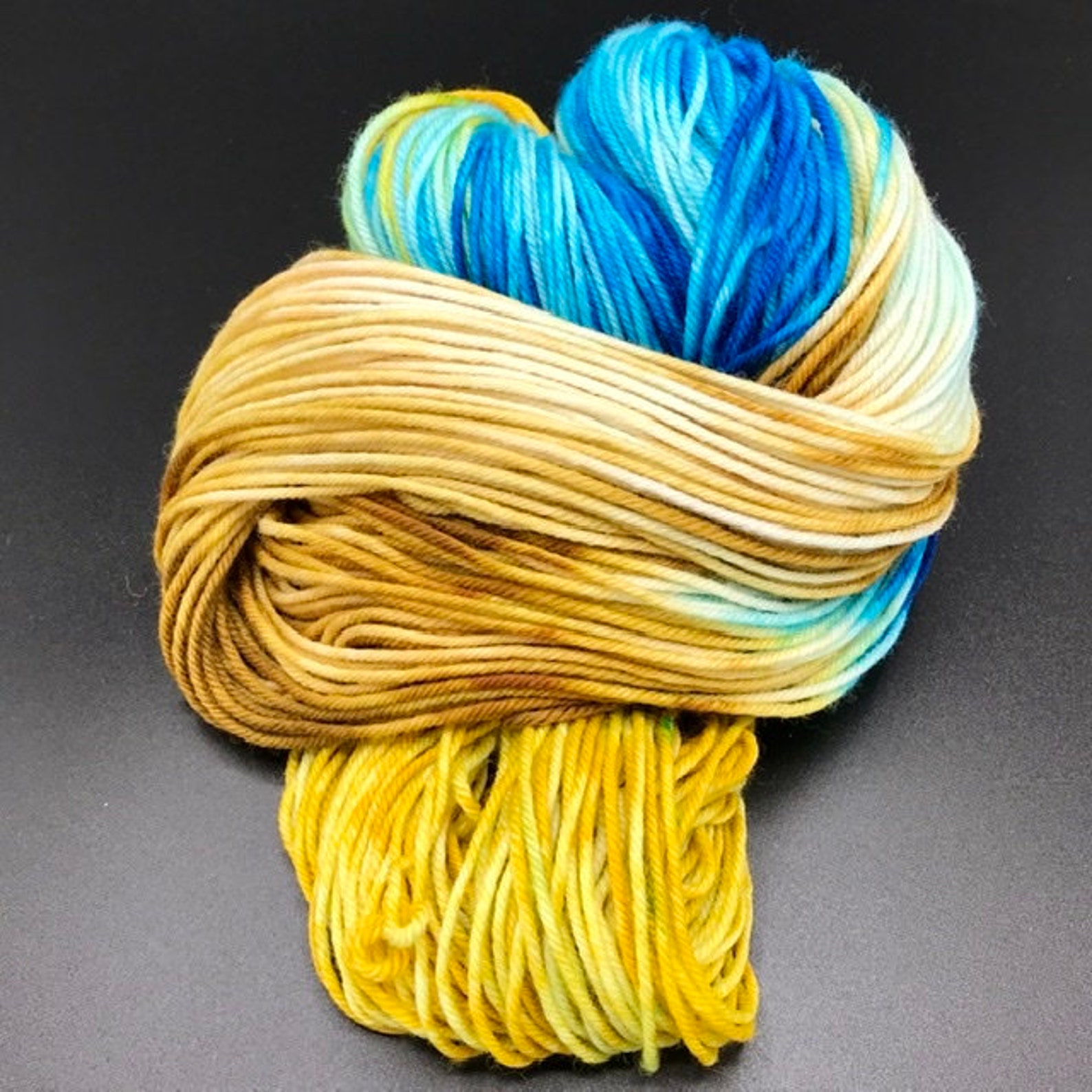 Are we there yet Yarn blue gold and brown yarn variegated Etsy