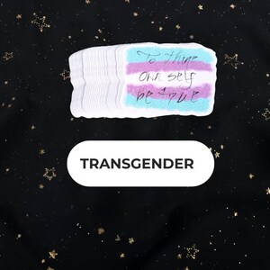 A Holographic Sticker of the Shakespeare quote from Hamlet "To Thine Own Self Be True" on the Trans Flag