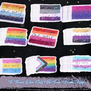 Photos of all the flags I have- AroAce, Asexual, Bisexual, Gay/LGBT, Lesbian, Nonbinary , Pansexual, The Progress Pride Flag, and the Transgender flag