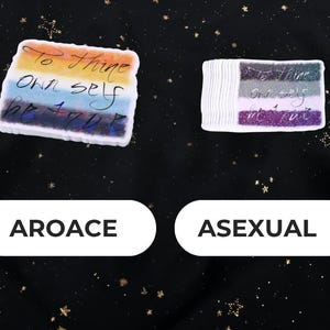 A Holographic Sticker of the Shakespeare quote from Hamlet "To Thine Own Self Be True" on the AroAce and Asexual Flags