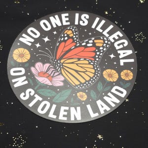 Waterproof, No one is Illegal on stolen land abolish ice magnet with a butterfly.