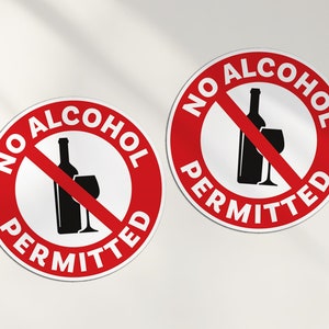 May include: Two red and white round signs with the text "NO ALCOHOL PERMITTED" and a black silhouette of a bottle and glass with a red line through it.